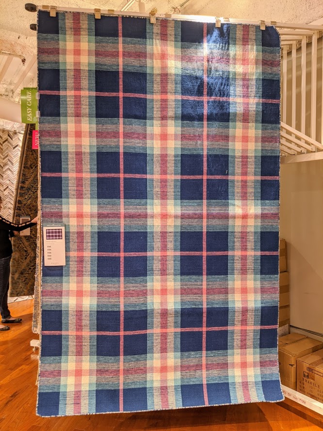 Plaid pattern area rug in Classic Blue
