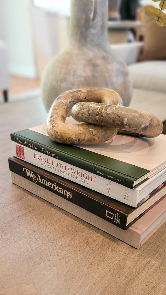 Charming Transitional Coffee Table Books and Decor